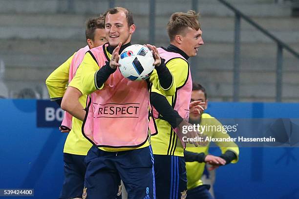 Roman Zozulya of Ukraine plays with the ball during a Ukraine training session at Stade Pierre-Mauray ahead of their opening UEFA EURO 2016 match...