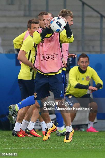 Roman Zozulya of Ukraine plays with the ball during a Ukraine training session at Stade Pierre-Mauray ahead of their opening UEFA EURO 2016 match...