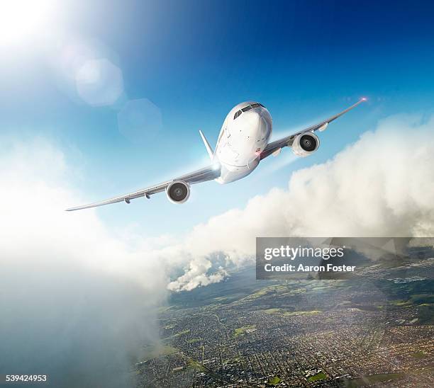 flying through the clouds - flugzeug stock-grafiken, -clipart, -cartoons und -symbole