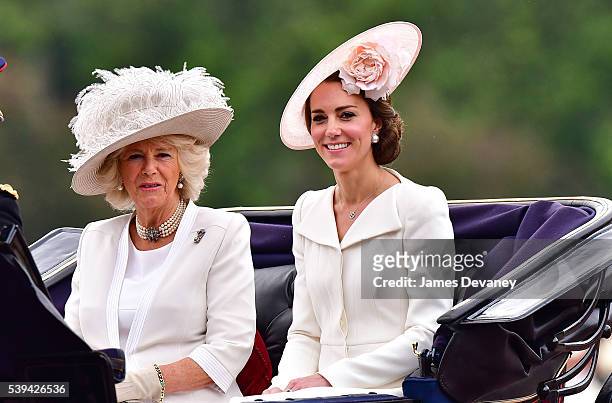 Camilla, Duchess of Cornwall and Catherine, Duchess of Cambridge leave Buckingham Palace during the Trooping the Colour, this year marking the...