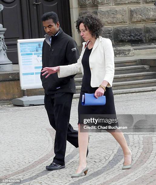 Participants in the 2016 Bilderberg conference Divesh Makan and Yasmine Kherbache sighted at the Dresden Opera House or 'Semperoper' during a group...