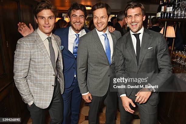 Oliver Cheshire, Robert Konjic, Paul Sculfor and Johannes Huebl attend a dinner hosted by Tommy Hilfiger and Dylan Jones to celebrate London...