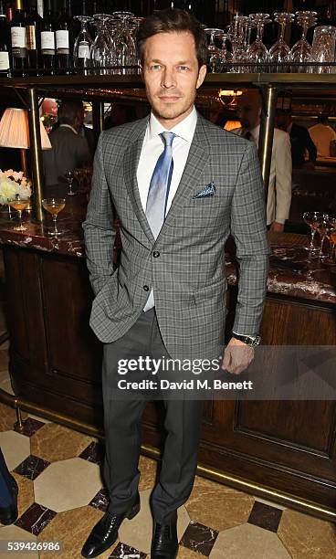 Paul Sculfor attends a dinner hosted by Tommy Hilfiger and Dylan Jones to celebrate London Collections Men SS17 at Cafe Monico on June 11, 2016 in...