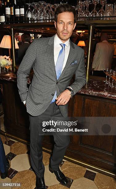 Paul Sculfor attends a dinner hosted by Tommy Hilfiger and Dylan Jones to celebrate London Collections Men SS17 at Cafe Monico on June 11, 2016 in...