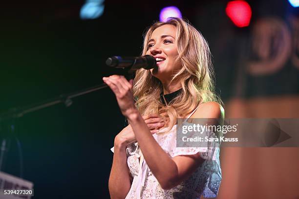 Sarah Darling performs on the Durango Music Spot Stage for WSM at the 2016 CMA Music Fest on June 11, 2016 in Nashville, Tennessee.