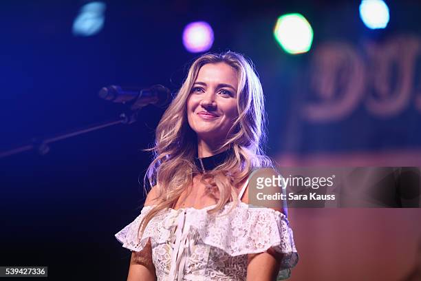 Sarah Darling performs on the Durango Music Spot Stage for WSM at the 2016 CMA Music Fest on June 11, 2016 in Nashville, Tennessee.