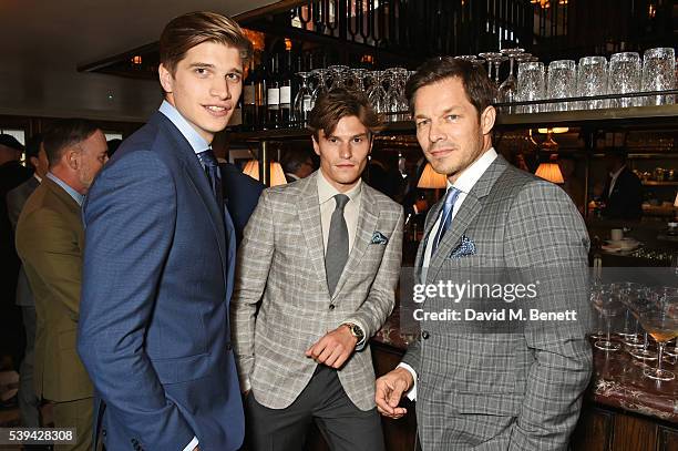 Toby Huntington-Whiteley, Oliver Cheshire and Paul Sculfor attend a dinner hosted by Tommy Hilfiger and Dylan Jones to celebrate London Collections...