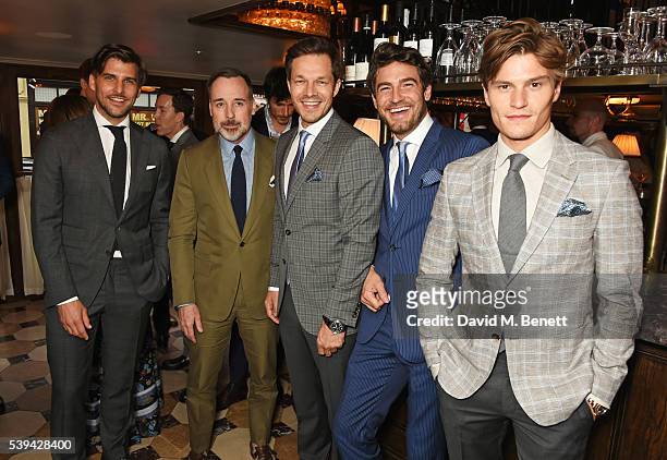 Johannes Huebl, David Furnish, Paul Sculfor, Robert Konjic and Oliver Cheshire attend a dinner hosted by Tommy Hilfiger and Dylan Jones to celebrate...