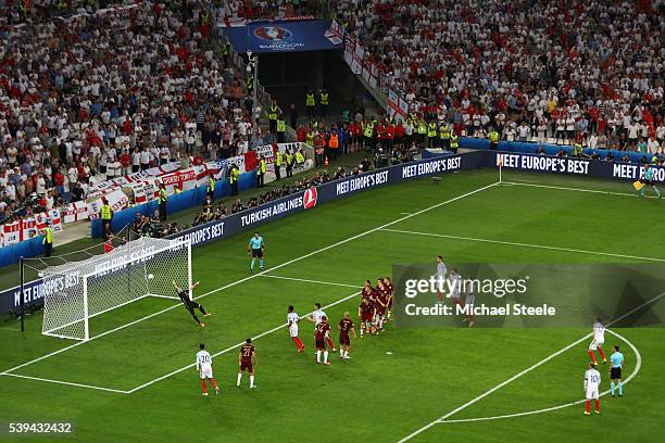 Eric Dier of England scores his team's first goal from a free kick during the UEFA EURO 2016 Group B match between England and Russia at Stade...