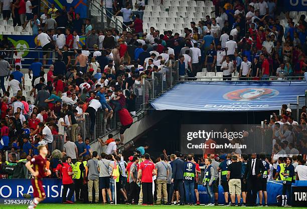 Fans clash after the UEFA EURO 2016 Group B match between England and Russia at Stade Velodrome on June 11, 2016 in Marseille, France.