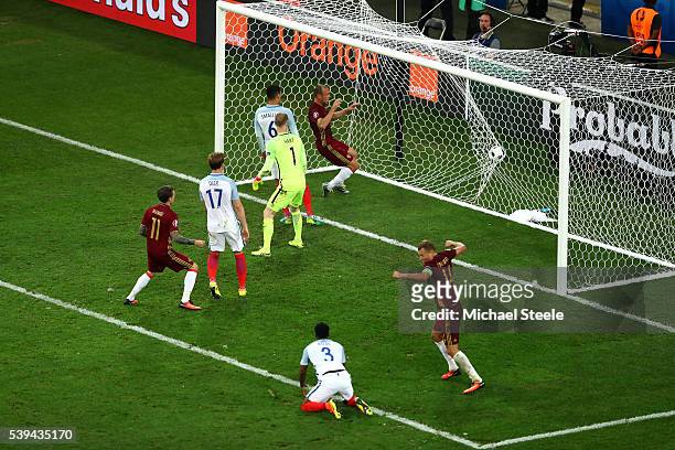 Vasili Berezutski of Russia scores his team's first goal during the UEFA EURO 2016 Group B match between England and Russia at Stade Velodrome on...