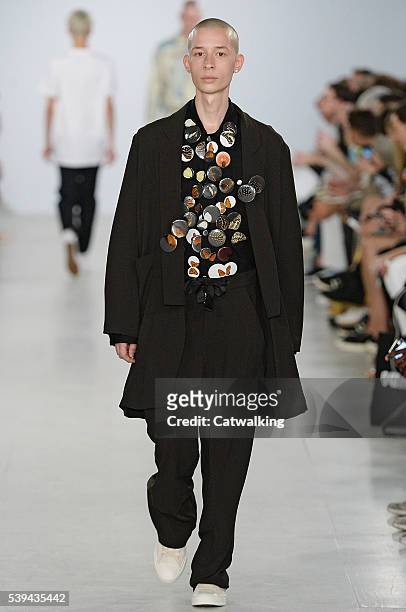 Model walks the runway at the Matthew Miller Spring Summer 2017 fashion show during London Menswear Fashion Week on June 11, 2016 in London, United...