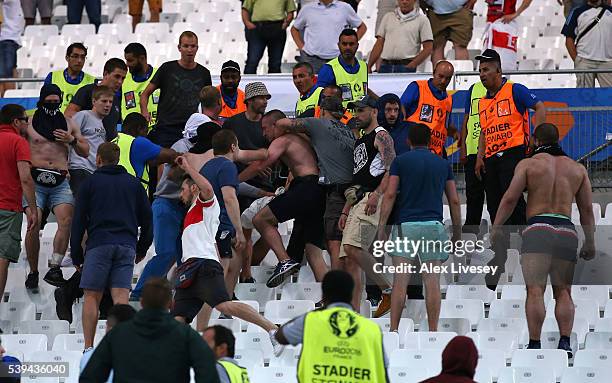 Fans clash after the UEFA EURO 2016 Group B match between England and Russia at Stade Velodrome on June 11, 2016 in Marseille, France.