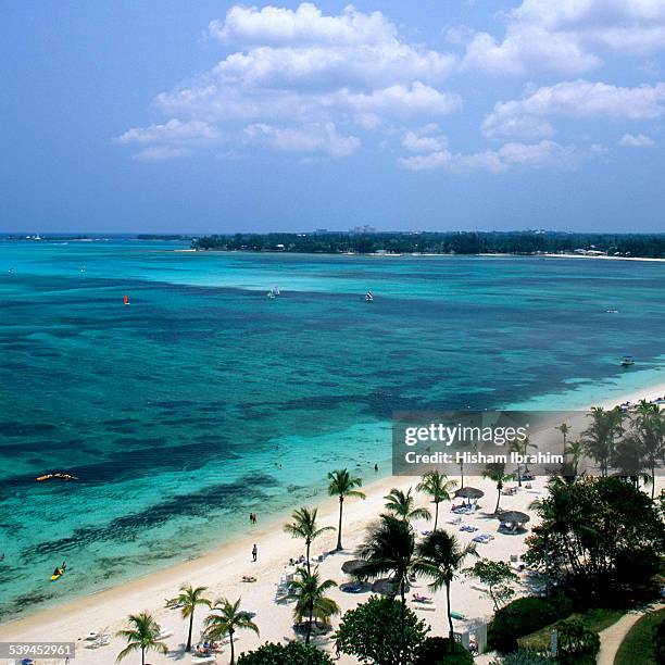 cable beach, nassau, bahamas - cable beach bahamas stock pictures, royalty-free photos & images