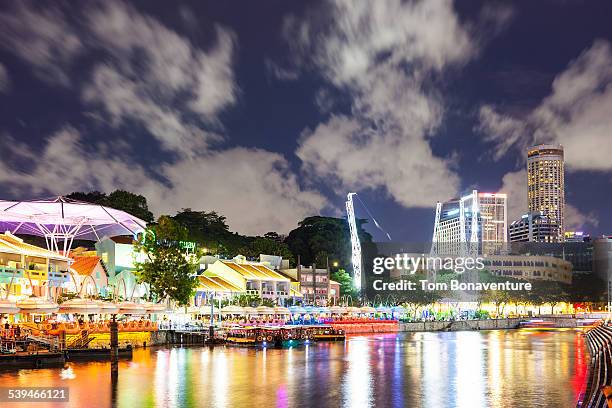 clarke quay in singapore - theme park singapore stock pictures, royalty-free photos & images