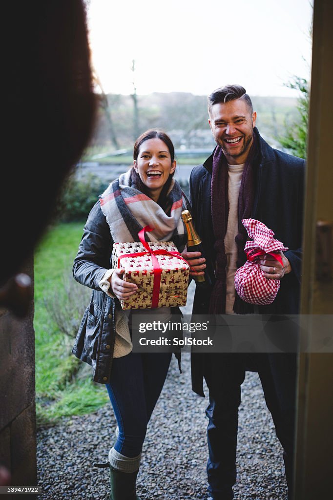 Friends Arriving with a Gifts