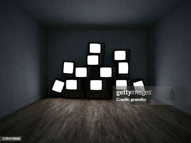 empty room of a group of tv sets - tv on wall stock pictures, royalty-free photos & images