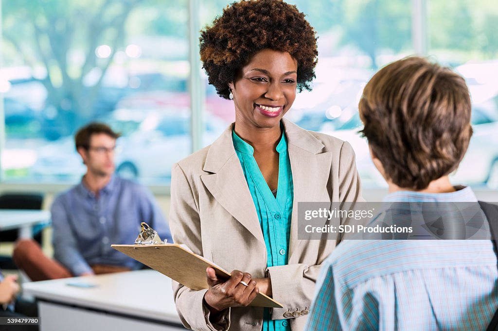 African American Teacher with student