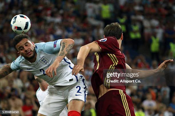 Kyle Walker of England battles with Georgi Schennikov of Russia during the UEFA EURO 2016 Group B match between England and Russia at Stade Velodrome...