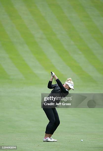 Brooke Henderson of Canada hits her second shot from the 16th fairway during the third round of the KPMG Women's PGA Championship at the Sahalee...