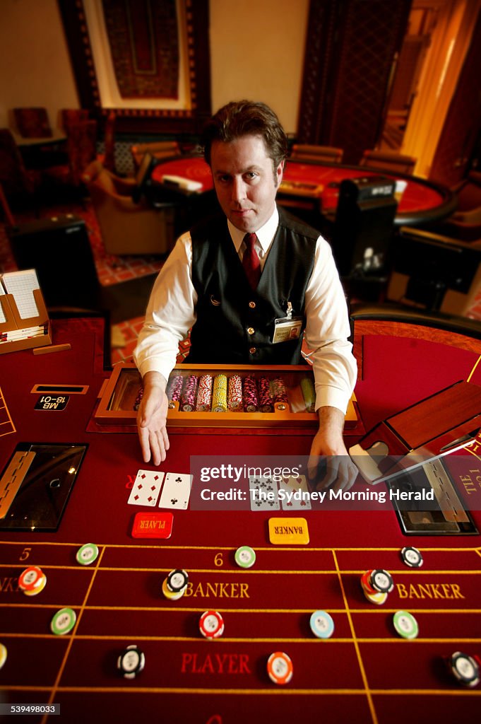 Jason Wicks, croupier, at a Baccarat table, Star City Casino, 9 August 2004 SMH