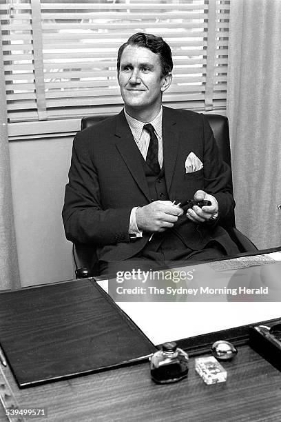 Malcolm Fraser smoking a pipe in his office in Parliament House in Canberra on 9 March 1971. SMH NEWS Picture by TED GOLDING