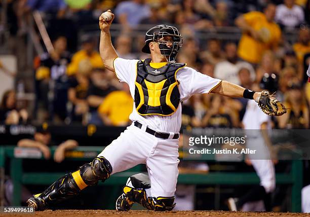 Erik Kratz of the Pittsburgh Pirates in action in the eighth inning during the game against the St. Louis Cardinals at PNC Park on June 11, 2015 in...
