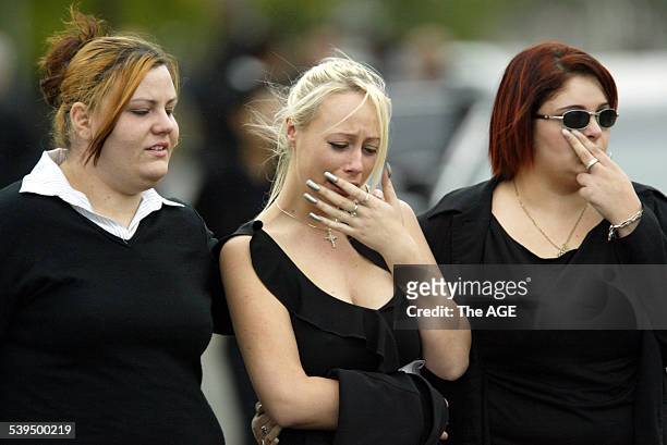 Photo shows the funeral of slain underworld figure Andrew Benji Veniamin at the Greek Orthodox Parish of St Andrews. Seen here unknown woman cry as...