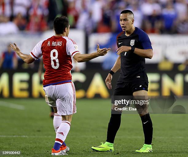 Bobby Wood of United States and Rodrigo Rojas of Paraguay exchange words in the second half during the Copa America Centenario Group C match at...