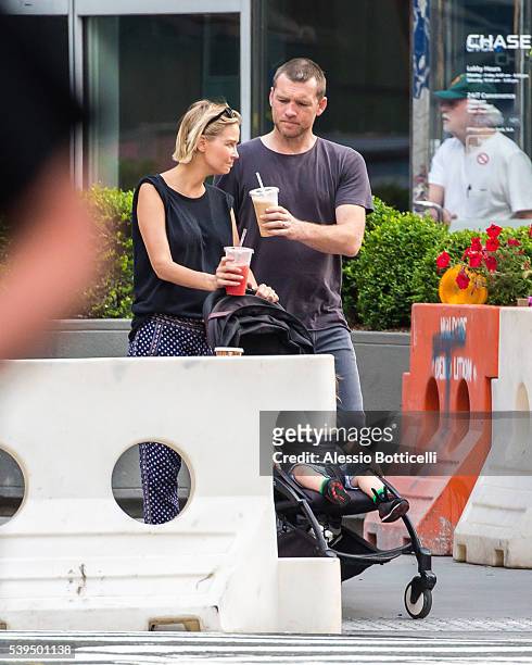 Sam Worthington with Lara Bingle and their baby Rocket Zot are seen buying fruit shakes from a street vendor in TriBeCa on June 11, 2016 in New York,...