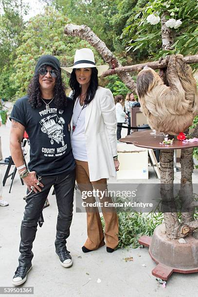 Slash and Meegan Hodges attend the Greater Los Angeles Zoo Association's 46th Annual 'Beastly Ball' at Los Angeles Zoo on June 11, 2016 in Los...