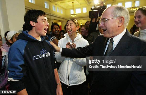 Prime Minister John Howard laughing at Girraween High School student Brett Buhagiar who accused the PM of ignoring him, in Old Parliament House where...