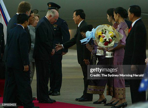 Australian Prime Minister John Howard arriving on his RAAF jet in Vientiane, Laos for the 2004 ASEAN Summit on 29 November 2004. He was met by...