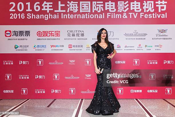 Actress Maria Grazia Cucinotta arrives for the red carpet of the 19th Shanghai International Film Festival at Shanghai Grand Theatre on June 11, 2016...