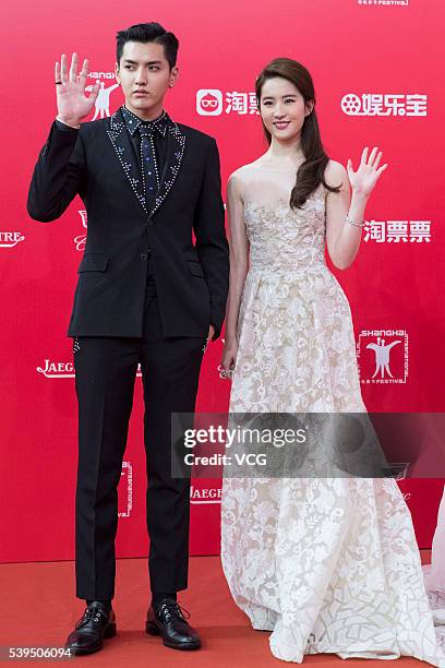 Actor Kris Wu and actress Liu Yifei arrive for the red carpet of the 19th Shanghai International Film Festival at Shanghai Grand Theatre on June 11,...