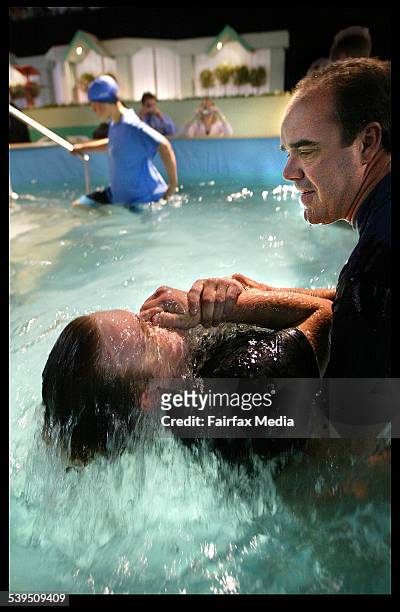 Jehovas Witness Convention at Rod Laver Arena where 9500 turned out to see about 70 of the faithful get baptised in a full emersion pool. THE SUNDAY...