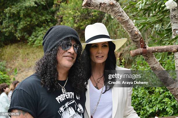 Slash and Meegan Hodges attend The Greater Los Angeles Zoo Association's 46th Annual Beastly Ball at Los Angeles Zoo on June 11, 2016 in Los Angeles,...