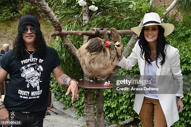 Slash, The Sloth, Charlie Dalton Shenanigans and Meegan Hodges attend The Greater Los Angeles Zoo Association's 46th Annual Beastly Ball at Los...