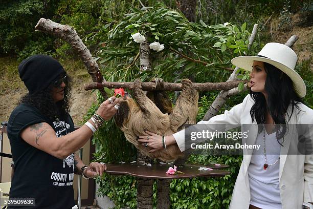 Slash, The Sloth, Charlie Dalton Shenanigans and Meegan Hodges attend The Greater Los Angeles Zoo Association's 46th Annual Beastly Ball at Los...