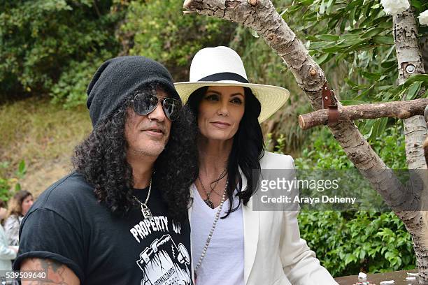 Slash and Meegan Hodges attend The Greater Los Angeles Zoo Association's 46th Annual Beastly Ball at Los Angeles Zoo on June 11, 2016 in Los Angeles,...
