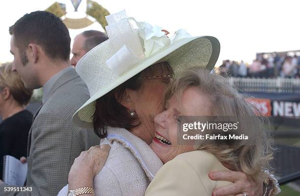 Horse racing at Rosehill Gardens on Saturday 28 August 2004. Jockey Hugh Bowman winner of race six on Doonan with owner Christine Cook hugging Jill...