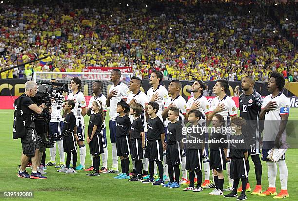 Colombian players sing their National Anthem before playing Costa Rica in group A match between Colombia and Costa Rica at NRG Stadium as part of...