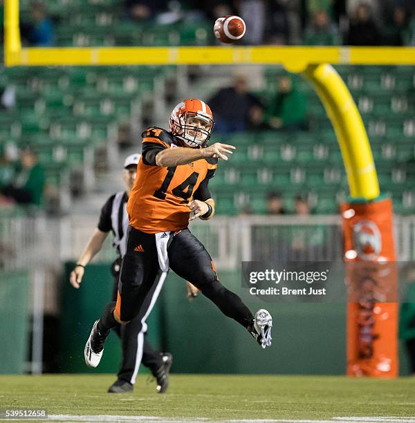 Travis Lulay of the BC Lions slings a pass in the pre-season game between the BC Lions and Saskatchewan Roughriders at Mosaic Stadium on June 11,...