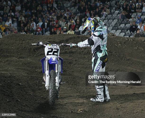 Supercross, a blur of motion as competitors nazigate the undulating terrain during competition at the Supercross masters Grand Final held at a packed...