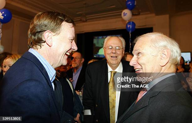 Treasurer Peter Costello with Tony Staley and Richard Alston at Liberal Party Headquarters in Melbourne after the Coalition, 9 October 2004 THE AGE...