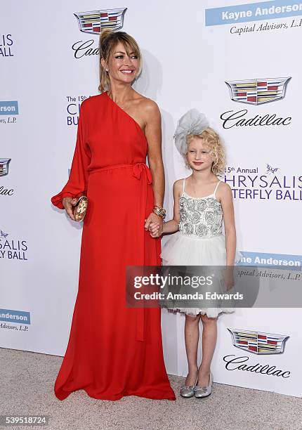 Actress Rebecca Gayheart-Dane and her daughter Billie Beatrice Dane arrive at the 15th Annual Chrysalis Butterfly Ball on June 11, 2016 in Brentwood,...