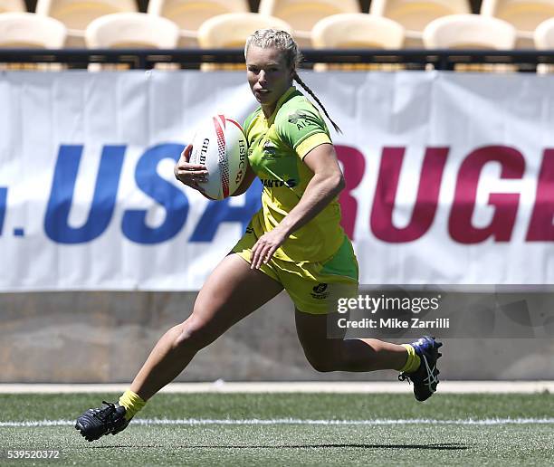 Emma Tonegato of Australia runs with the ball during the match against the United States at Fifth Third Bank Stadium on April 9, 2016 in Kennesaw,...