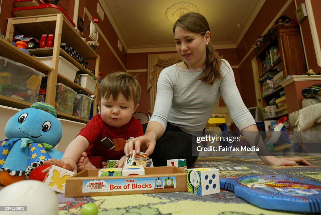 Nanny Kirsty Smith at work with 1 year old Ashton at Chatswood, 9 November 2004