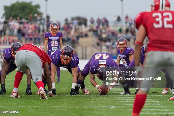 Running Back Ivo Schnberner of Samsung Frankfurt Universe ready to snap the ball for a field goal try from Defensive Back Ricardo Rodrigues of...