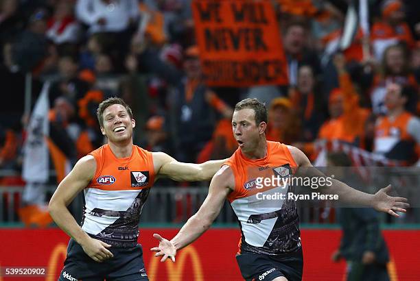 Steve Johnson of the Giants celebrates a goal during the round 12 AFL match between the Greater Western Sydney Giants and the Sydney Swans at...